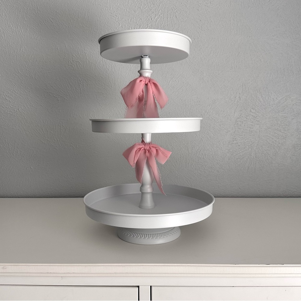 White Three-Tiered Stand with Pink Silk Bow Accents